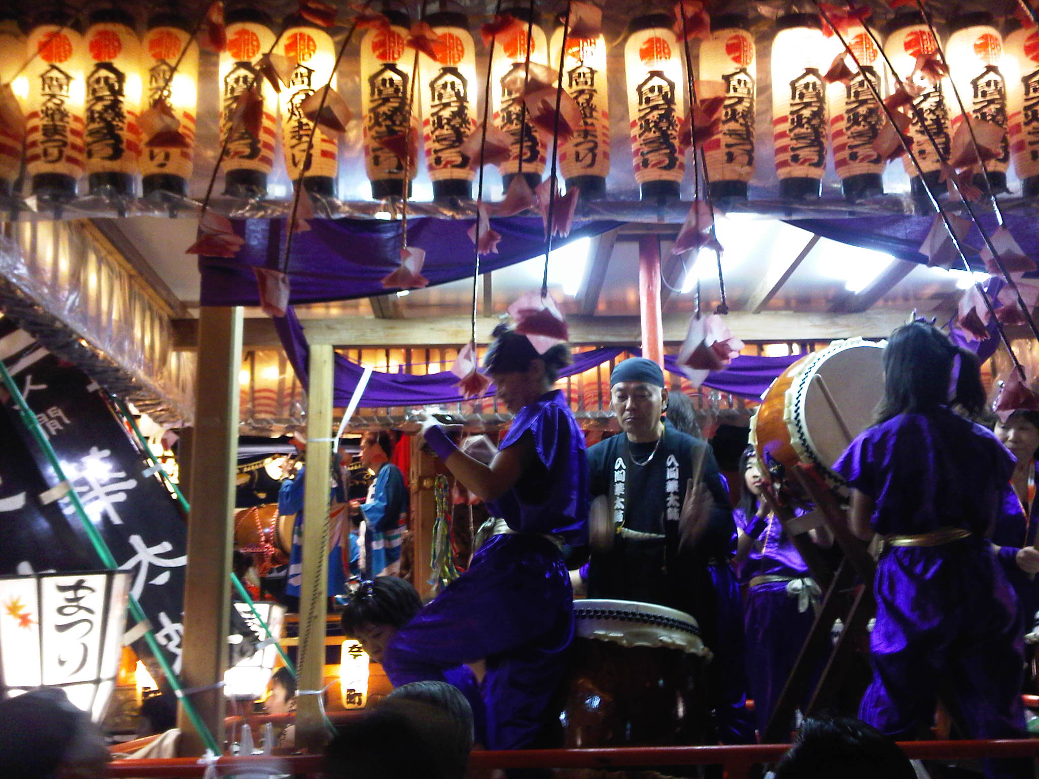 A woman playing festival music